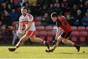 5 March 2017; Emmett McGuckin of Derry  in action against Niall Donnelly of Down during the Allianz Football League Division 2 Round 4 match between Derry and Down at Celtic Park, Derry, Co. Derry Photo by Oliver McVeigh/Sportsfile