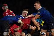 4 March 2017; Tadhg Beirne of Scarlets is tackled by Hayden Triggs, left, Dan Leavy, centre, and Ross Molony of Leinster during the Guinness PRO12 Round 17 match between Leinster and Scarlets at the RDS Arena in Ballsbridge, Dublin. Photo by Ramsey Cardy/Sportsfile