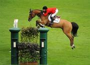 3 August 2011; Christine McCrea, USA, competing on Avenir, during the Irish Sports Council Classic. Dublin Horse Show 2011, RDS, Ballsbridge, Dublin. Picture credit: Barry Cregg / SPORTSFILE
