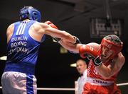 10 August 2011; Karl Brabazon, St. Saviours OBA, right, exchanges punches with Martin Wall, Crumlin, left, during their 69kg bout. IABA Senior Open Elite Competition 2011, National Stadium, Dublin. Picture credit: Barry Cregg / SPORTSFILE