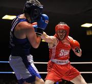 10 August 2011; Karl Brabazon, St. Saviours OBA, right, exchanges punches with Martin Wall, Crumlin, during their 69kg bout. IABA Senior Open Elite Competition 2011, National Stadium, Dublin. Picture credit: Barry Cregg / SPORTSFILE