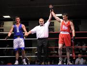 10 August 2011; Referee Paul McMahon declares Karl Brabazon, St. Saviours OBA, right, the winner over Martin Wall, Crumlin, after their 69kg bout. IABA Senior Open Elite Competition 2011, National Stadium, Dublin. Picture credit: Barry Cregg / SPORTSFILE