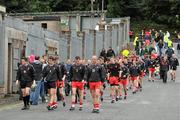 17 July 2011; The Derry team make their way into the ground before the game. Ulster GAA Football Senior Championship Final, Derry v Donegal, St Tiernach's Park, Clones, Co. Monaghan. Picture credit: Brendan Moran / SPORTSFILE