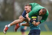 6 March 2017; Andrew Conway of Ireland carries teammate Simon Zebo during squad training at Carton House in Maynooth, Co. Kildare. Photo by Seb Daly/Sportsfile