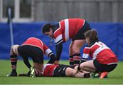 4 March 2017; Anne Molohan of Wicklow is tended to by team mates as she lies injured during the Leinster Women’s Day Division 3 Playoffs match between Wicklow and Garda/Westmanstown at St. Michael's College in Ailesbury Road, Dublin. Photo by David Fitzgerald/Sportsfile