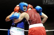 13 August 2011; Kenny Egan, Neilstown, left, exchanges punches with Stephen Ward, Monkstown, Co. Antrim, during their 91kg Final bout. IABA Senior Open Elite Competition 2011, National Stadium, Dublin. Picture credit: Matt Browne / SPORTSFILE