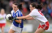 13 August 2011; Tracey Lawlor, Laois, in action against Maura Kelly, Tyrone. TG4 All-Ireland Ladies Senior Football Championship Quarter-Final, Laois v Tyrone, St Brendan's Park, Birr, Co. Offaly. Picture credit: Stephen McCarthy / SPORTSFILE