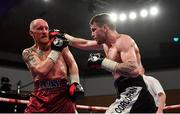 10 March 2017; Gary Corcoran, right, in action against James Gorman during their welterweight bout in the Waterfront Hall in Belfast. Photo by Ramsey Cardy/Sportsfile