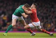 10 March 2017; Garry Ringrose of Ireland is tackled by Rhys Webb of Wales during the RBS Six Nations Rugby Championship match between Wales and Ireland at the Principality Stadium in Cardiff, Wales. Photo by Brendan Moran/Sportsfile