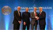 10 March 2017; Jim McKeever, Ballymaguigan St Trea’s, Co Derry, second from right, is presented with the Ulster Award, by from left, Denis O’Callaghan, Head of Retail Banking, AIB, Ardstiúrthóir TG4, Alan Esslemont, and Uachtarán Chumann Lúthchleas Gael Aogán Ó Fearghail during the GAA President's Awards 2017 at Croke Park in Dublin. Photo by Piaras Ó Mídheach/Sportsfile