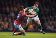 10 March 2017; Keith Earls of Ireland is tackled by Rhys Webb of Wales during the RBS Six Nations Rugby Championship match between Wales and Ireland at the Principality Stadium in Cardiff, Wales. Photo by Brendan Moran/Sportsfile