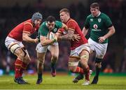 10 March 2017; Robbie Henshaw of Ireland is tackled by Jonathan Davies, left, and Ross Moriarty of Wales during the RBS Six Nations Rugby Championship match between Wales and Ireland at the Principality Stadium in Cardiff, Wales. Photo by Brendan Moran/Sportsfile