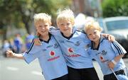 14 August 2011; Dublin supporters and brothers, from left, Adam, age 7, Ian, age 9, and Colin McAweeney, age 4, from Killester, on their way to the GAA Hurling All-Ireland Senior Championship Semi-Final, Croke Park, Dublin. Picture credit: Brian Lawless / SPORTSFILE