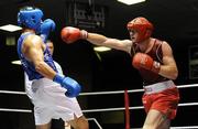 13 August 2011; Stephen Ward, Monkstown, Co. Antrim, right, exchanges punches with Kenny Egan, Neilstown, during their 91kg final bout. IABA Senior Open Elite Competition 2011, National Stadium, Dublin. Picture credit: Matt Browne / SPORTSFILE