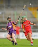 13 August 2011; Michelle O'Leary, Wexford, in action against Elaine O'Riordan, Cork. All-Ireland Senior Camogie Championship Semi-Final in association with RTE Sport, Cork v Wexford, Nowlan Park, Kilkenny. Picture credit: Pat Murphy / SPORTSFILE