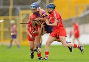 13 August 2011; Katrina Parrock, Wexford, in action against Anna Geary, left, and Jenny Duffy, Cork. All-Ireland Senior Camogie Championship Semi-Final in association with RTE Sport, Cork v Wexford, Nowlan Park, Kilkenny. Picture credit: Pat Murphy / SPORTSFILE