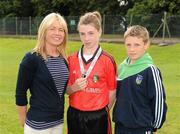 14 August 2011; Go Games Exhibition referee Caileigh O'Reilly, St. Joseph's N.S. Ballybrown, Limerick, with her mother Elaine O'Reilly and her brother Cillian O'Reilly. Go Games Exhibition - Sunday 14th August 2011, Clonliffe College,  Dublin. Picture credit: Ray McManus / SPORTSFILE