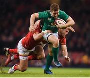 10 March 2017; Paddy Jackson of Ireland is tackled by Scott Baldwin, left, and Gareth Davies of Wales during the RBS Six Nations Rugby Championship match between Wales and Ireland at the Principality Stadium in Cardiff, Wales. Photo by Stephen McCarthy/Sportsfile