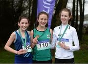 11 March 2017; Medalists in the Minor Girls race, from left, bronze medallist Eimear Maher of  Mount Anville, Dublin, gold medalist Cara Laverty of Thornhill college, Derry and Silver medalist Victoria Lighbody of Wallace HS, Lisburn during the Irish Life Health All Ireland Schools Cross Country at Mallusk Playing Fields in Newtownabbey, Co. Antrim. Photo by Oliver McVeigh/Sportsfile