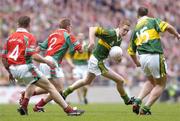 26 September 2004; Colm Cooper, Kerry, supported by team-mate, John Crowley (15) in action against Mayo's Dermot Geraghty and Gary Ruane, left. Bank of Ireland All-Ireland Senior Football Championship Final, Kerry v Mayo, Croke Park, Dublin. Picture credit; Brian Lawless / SPORTSFILE