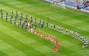 24 April 2011; The Cork and Dublin players follow the Artane School of Music Band during the pre-match parade. Allianz Football League Division 1 Final, Dublin v Cork, Croke Park, Dublin. Picture credit: Ray McManus / SPORTSFILE