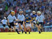 14 August 2011; Tipperary's Norette Casey, Ardfert N.S., Ardfert, Co. Kerry, in action against Dublin players, from left, Aoife Coughlin, Crecora N.S., Patrickswell, Co. Limerick, Sorcha McDonald, Clontibret N.S., Co. Monaghan, and Tierna Johnston, Holy Child P.S., Belfast, Co. Antrim. Go Games Exhibition - Sunday 14th August 2011, Croke Park, Dublin. Picture credit: Ray McManus / SPORTSFILE