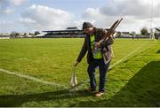 12 March 2017; John Meade collects the side line flags after the Allianz Hurling League Division 1A Round 4 match between Clare and Dublin at Cusack Park in Ennis, Co. Clare. Photo by Ray McManus/Sportsfile