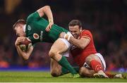 10 March 2017; Garry Ringrose of Ireland is tackled by Jamie Roberts of Wales during the RBS Six Nations Rugby Championship match between Wales and Ireland at the Principality Stadium in Cardiff, Wales. Photo by Stephen McCarthy/Sportsfile