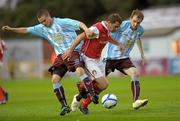 19 August 2011; David Mulcahy, St Patrick's Athletic, in action against Tiernan Mulvenna, left, and Mark O'Brien, Drogheda United. Airtricity League Premier Division, St Patrick's Athletic v Drogheda United, Richmond Park, Dublin. Photo by Sportsfile