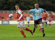 19 August 2011; Derek Pender, St Patrick's Athletic, in action against Dave Rogers, Drogheda United. Airtricity League Premier Division, St Patrick's Athletic v Drogheda United, Richmond Park, Dublin. Photo by Sportsfile