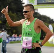 20 August 2011; Jose Carols Hernandez, from Spain, celebrates after winning the Men's Frank Duffy 10 Mile race, Phoenix Park, Dublin. Picture credit: Pat Murphy / SPORTSFILE