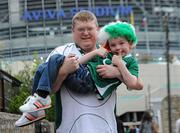 20 August 2011; Mark Manning and his son Darragh, from Limerick City, on their way to the Ireland v France Rugby World Cup Warm-up game. Aviva Stadium, Lansdowne Road, Dublin. Picture credit: Matt Browne / SPORTSFILE
