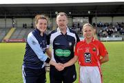 20 August 2011; Referee John Niland, with captains Cliodhna O'Connor, Dublin, and Amy O'Shea, Cork. TG4 All-Ireland Ladies Senior Football Championship Quarter-Final, Dublin v Cork, St Brendan's Park, Birr, Co. Offaly. Picture credit: David Maher / SPORTSFILE