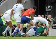 20 August 2011; Cian Healy, Ireland, goes over to score his side's first try despite the efforts of Morgan Parra, France. Rugby World Cup Warm-up game, Ireland v France, Aviva Stadium, Lansdowne Road, Dublin. Picture credit: Stephen McCarthy / SPORTSFILE