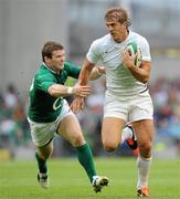 20 August 2011; Aurelien Rougerie, France, is tackled by Gordon D'Arcy, Ireland. Rugby World Cup Warm-up game, Ireland v France, Aviva Stadium, Lansdowne Road, Dublin. Picture credit: Matt Browne / SPORTSFILE