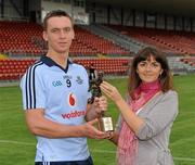 20 August 2011; Mark Schutte, Dublin, is presented with his Bord Gais Energy Man of the Match award by Irene Gowing, Sponsorship manager, Bord Gais Energy. Bord Gais Energy GAA Hurling Under 21 All-Ireland Championship Semi-Final, Antrim v Dublin, Pairc Esler, Newry, Co. Down. Picture credit: Oliver McVeigh / SPORTSFILE