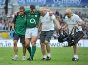 20 August 2011; Cian Healy, Ireland, is helped from the field by team physio Cameron Steele, left, and team doctor, Dr. Eanna Falvey. Rugby World Cup Warm-up game, Ireland v France, Aviva Stadium, Lansdowne Road, Dublin. Picture credit: Brendan Moran / SPORTSFILE