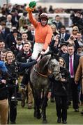 14 March 2017; Jockey Jack Kennedy celebrates as he enters the winners enclosure after winning the Sky Bet Supreme Novices' Hurdle on Labaik during the Cheltenham Racing Festival at Prestbury Park, in Cheltenham, England. Photo by Seb Daly/Sportsfile
