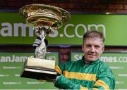 14 March 2017; Jockey Noel Fehily with the trophy after winning the Stan James Champion Hurdle Challenge Trophy on Buveur D'Air during the Cheltenham Racing Festival at Prestbury Park, in Cheltenham, England. Photo by Seb Daly/Sportsfile