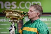 14 March 2017; Jockey Noel Fehily with the trophy after winning the Stan James Champion Hurdle Challenge Trophy on Buveur D'Air during the Cheltenham Racing Festival at Prestbury Park, in Cheltenham, England. Photo by Seb Daly/Sportsfile