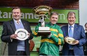 14 March 2017; Trainer Nicky Henderson, left, jockey Noel Fehily, centre, and owner JP McManus after winning the Stan James Champion Hurdle Challenge Trophy with Buveur D'Air during the Cheltenham Racing Festival at Prestbury Park, in Cheltenham, England. Photo by Seb Daly/Sportsfile