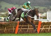 14 March 2017; Buveur D'Air, with Noel Fehily up, jumps the last on their way to winning the Stan James Champion Hurdle Challenge Trophy during the Cheltenham Racing Festival at Prestbury Park, in Cheltenham, England. Photo by Seb Daly/Sportsfile
