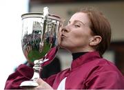 14 March 2017; Jockey Lisa O'Neill kisses the trophy after winning the JT McNamara National Hunt Challenge Cup Amateur Riders' Novices' Steeple Chase on Tiger Roll during the Cheltenham Racing Festival at Prestbury Park, in Cheltenham, England. Photo by Seb Daly/Sportsfile