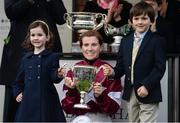 14 March 2017; Jockay Lisa O'Neill with Olivia and Harry McNamara, children of the late jockey JT McNamara, after winning the JT McNamara National Hunt Challenge Cup Amateur Riders' Novices' Steeple Chase during the Cheltenham Racing Festival at Prestbury Park, in Cheltenham, England. Photo by Seb Daly/Sportsfile