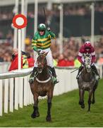 14 March 2017; Noel Fehily celebrates crossing the line to win the Stan James Champion Hurdle Challenge Trophy on Buveur D'Air ahead of Petit Mouchoir, with Bryan Cooper up, who finished second, during the Cheltenham Racing Festival at Prestbury Park, in Cheltenham, England. Photo by Cody Glenn/Sportsfile