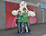 20 August 2011; Showing their team support with the Bord Gais Mascot are Jay Ryan, aged 7, and Devin Ryan, aged 10, from Newport, Co. Limerick. Bord Gais Energy GAA Hurling Under 21 All-Ireland Championship Semi-Final, Galway v Limerick, Semple Stadium, Thurles, Co. Tipperary. Picture credit: Barry Cregg / SPORTSFILE