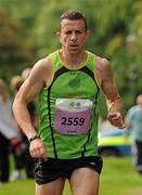 20 August 2011; Barry Minnock, from Rathfarnham, Dublin, in action during the National Lottery Frank Duffy 10 Mile race, Phoenix Park, Dublin. Picture credit: Pat Murphy / SPORTSFILE