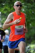 20 August 2011; Niall O'Callaghan, from Limerick, in action during the National Lottery Frank Duffy 10 Mile race, Phoenix Park, Dublin. Picture credit: Conor O Beolain / SPORTSFILE