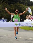 20 August 2011; Jose Carols Hernandez, from Spain, crosses the finish line to win the men's Frank Duffy 10 Mile race, Phoenix Park, Dublin. Picture credit: Pat Murphy / SPORTSFILE