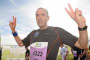 20 August 2011; Fearghal Bracken, from Dublin, celebrates after finishing the National Lottery Frank Duffy 10 Mile race, Phoenix Park, Dublin. Picture credit: Pat Murphy / SPORTSFILE